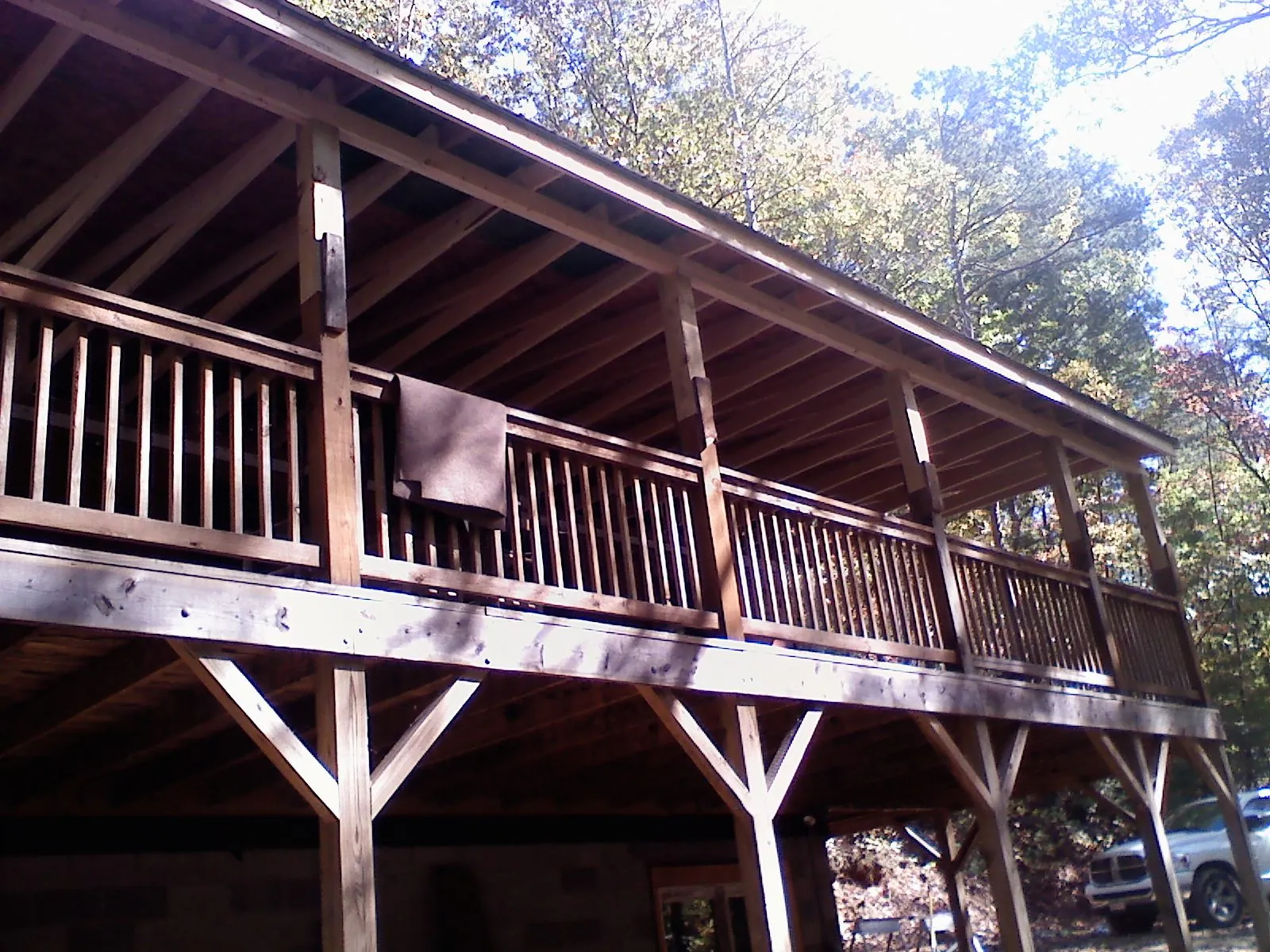Timber framing under a new elevated porch and deck — Roof Leak Repair in Newmarket by Roofing Brothers